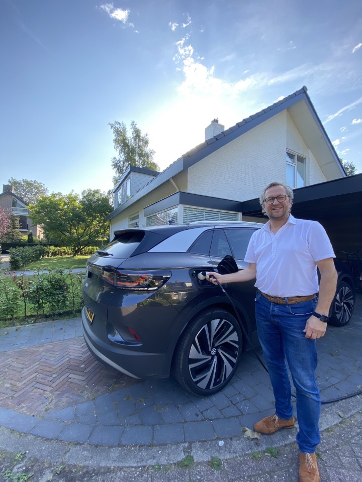 DMG Sales Representative Flip van Dalen with his electric VW ID